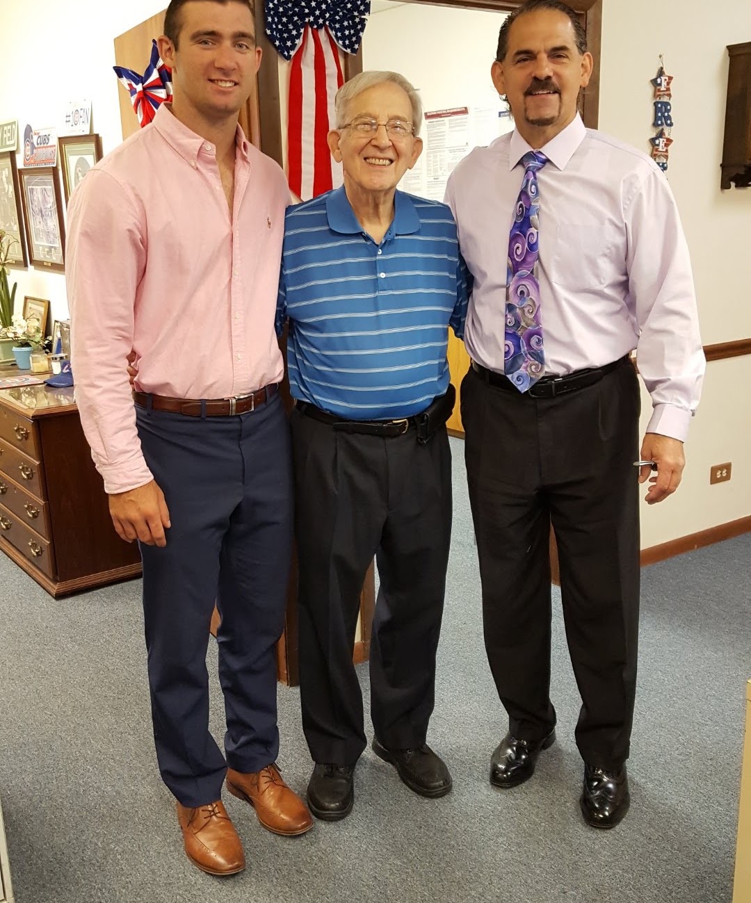 Three generations of the Danegelis family in the Elmhurst office: Constantine, Gust, and John